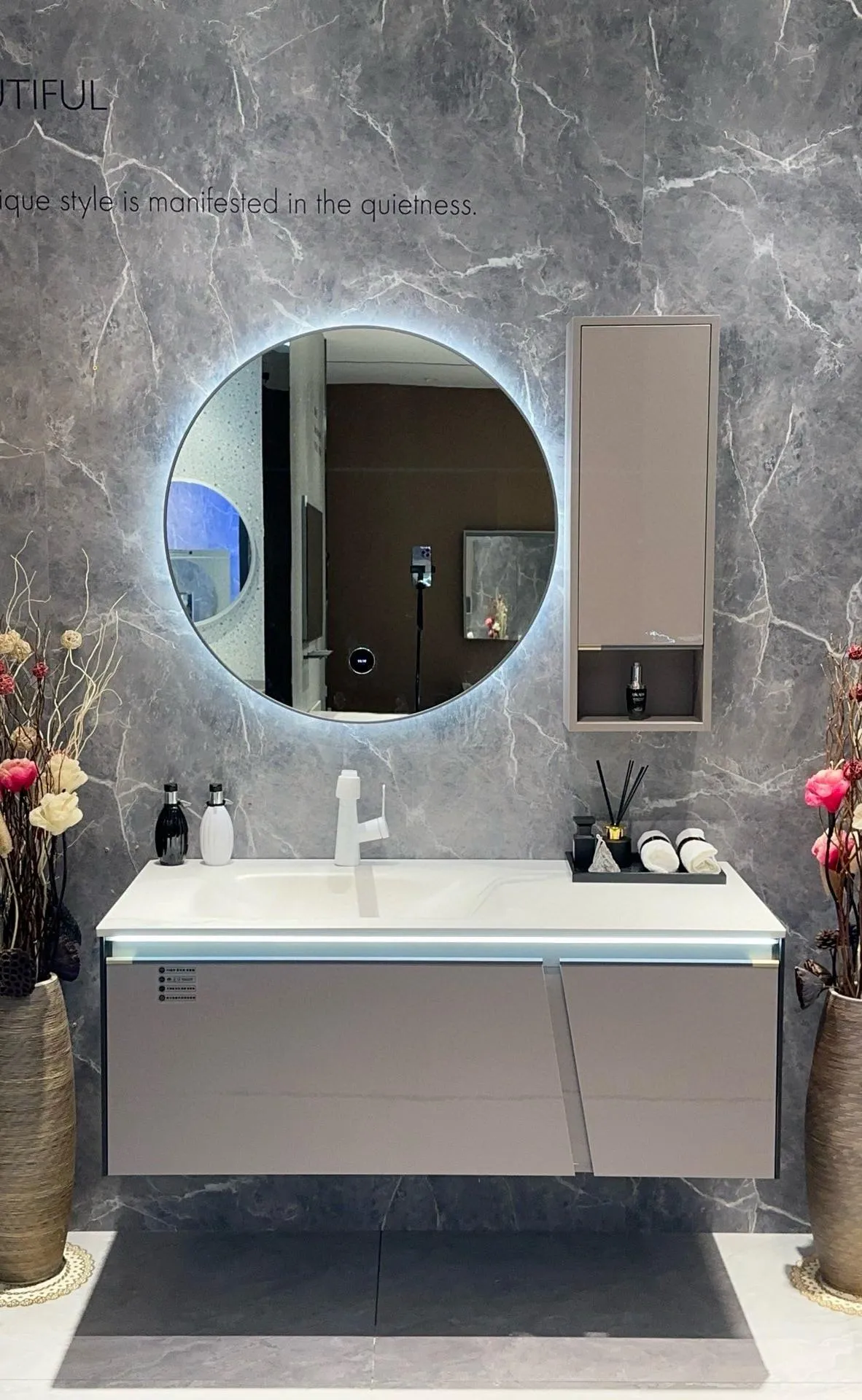 Ombra 120 vanity: statement-width 120 cm sintered stone basin counter with dark wall-hung cabinet.